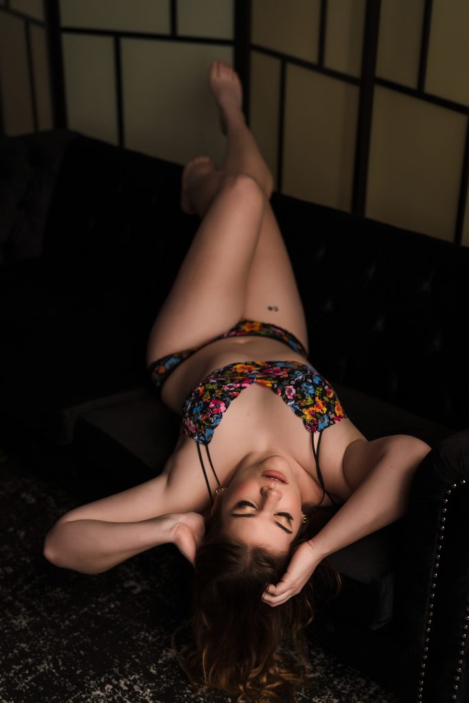 Laying on the couch boudoir photo. Tall woman boudoir photos - kc boudoir- Madera Studios
