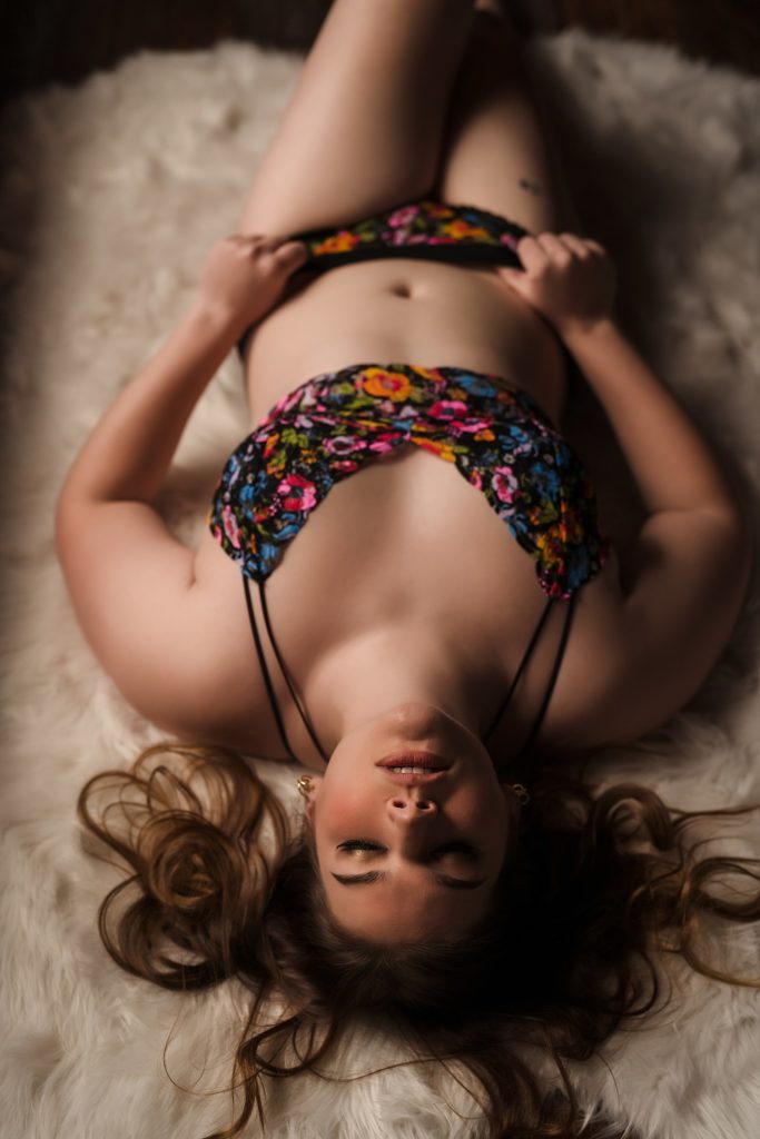 Laying on a fur rug boudoir photo. Tall woman boudoir photos - kc boudoir- Madera Studios